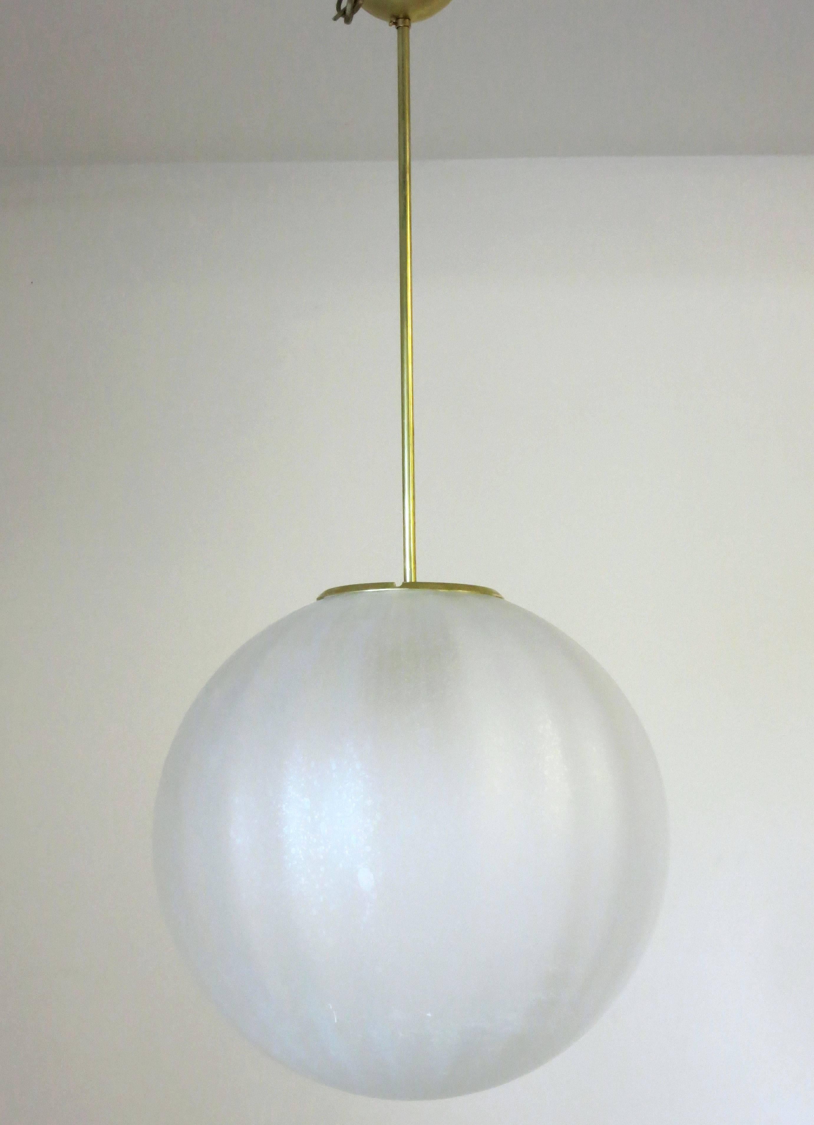 Vintage Italian pendant with frosted Murano glass globe hand blown with very subtle vertical texture, mounted on brass hardware / Made in Italy circa 1960’s
1 light / E26 or E27 type / max 60W
Diameter: 16 inches / Height: 35.5 inches including rod