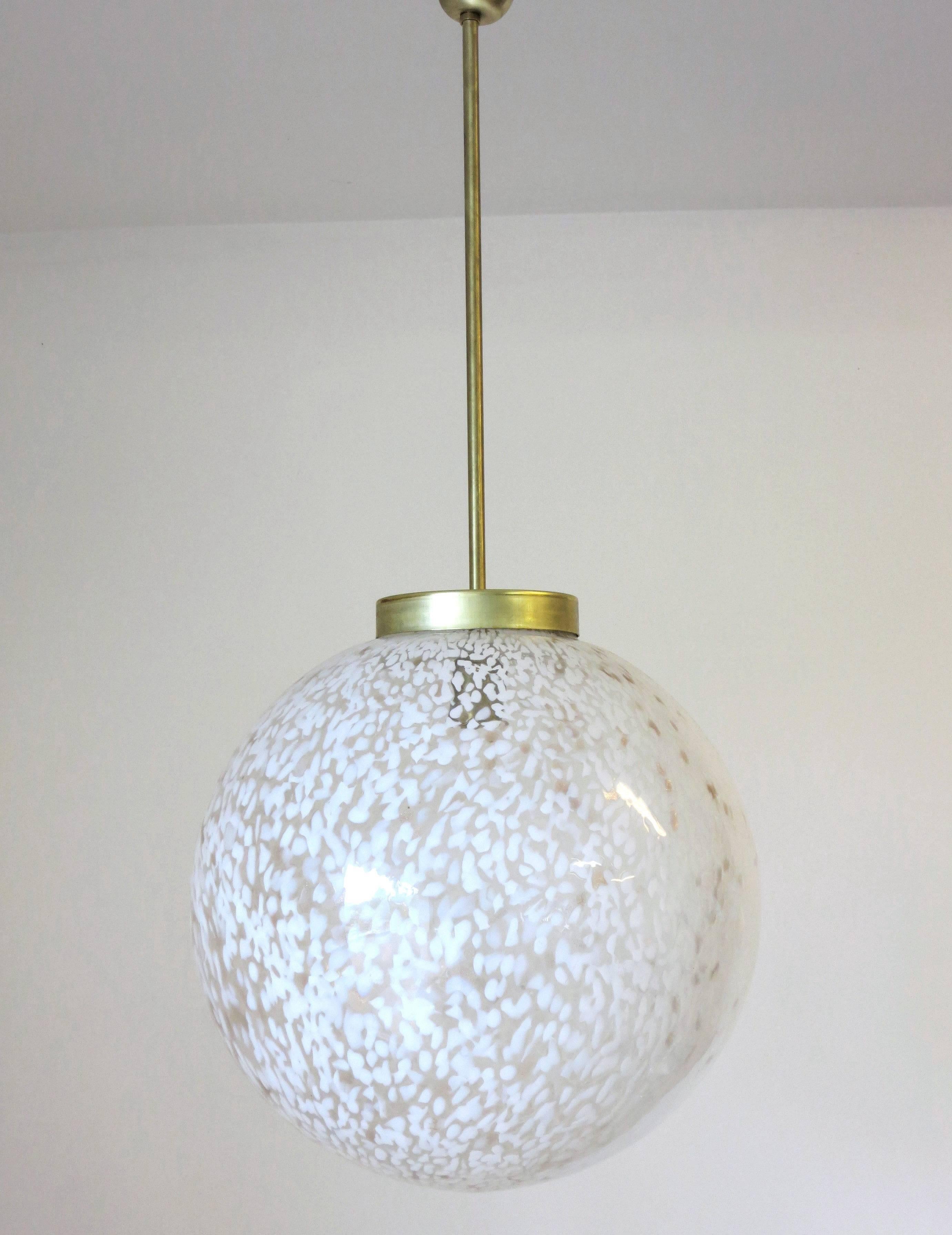 Italian Murano clear and white glass globe pendant.
Single light socket ; wired for the U.S.