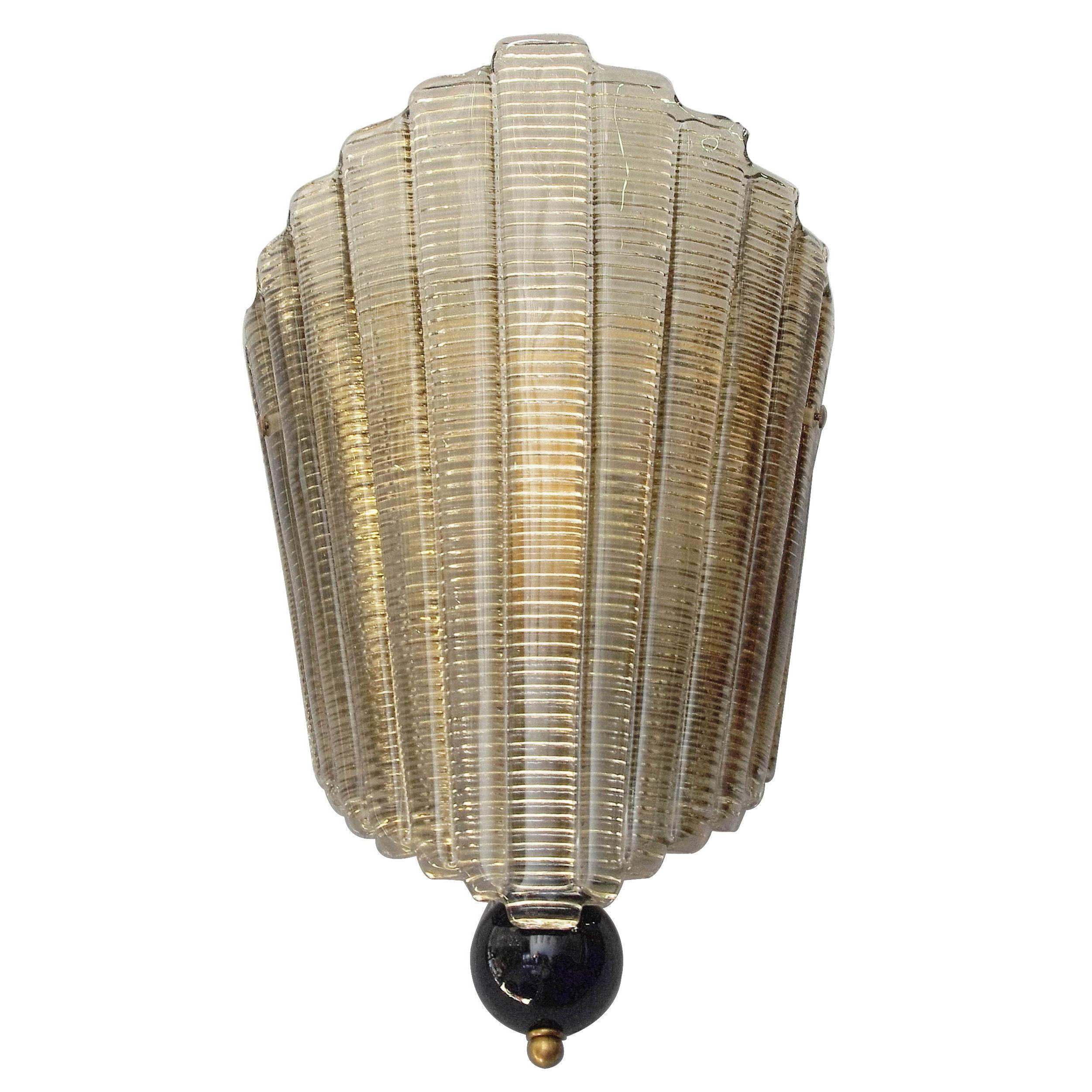 Italian wall sconces shown in smoky Murano glass and brass details
One light / E26 type / max 40W each
Measures: Height 17 inches, width 11 inches, depth 6.5 inches
A pair currently in stock in Palm Springs on summer sale! at $2,879.

 