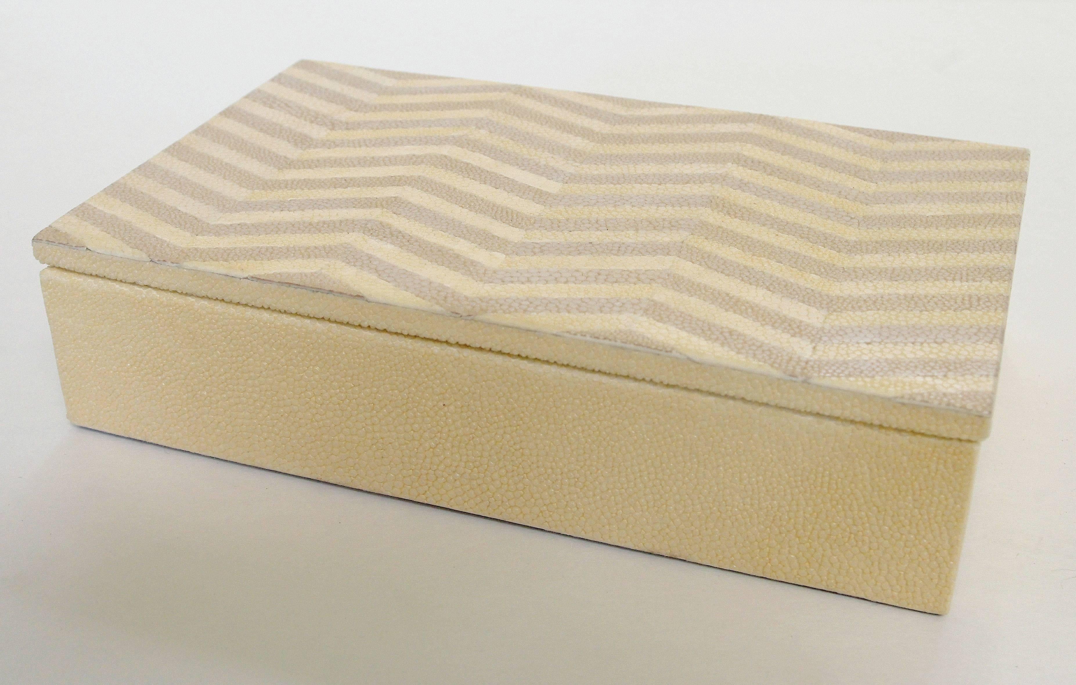 Ivory and brown Shagreen box with zigzag pattern and gray suede interior 
Measures: Depth 5 inches, width 8 inches, height 2 inches.
1 in stock in Palm Springs currently ON SALE for $699!!!
Order Reference #: MR62
This piece makes for great and