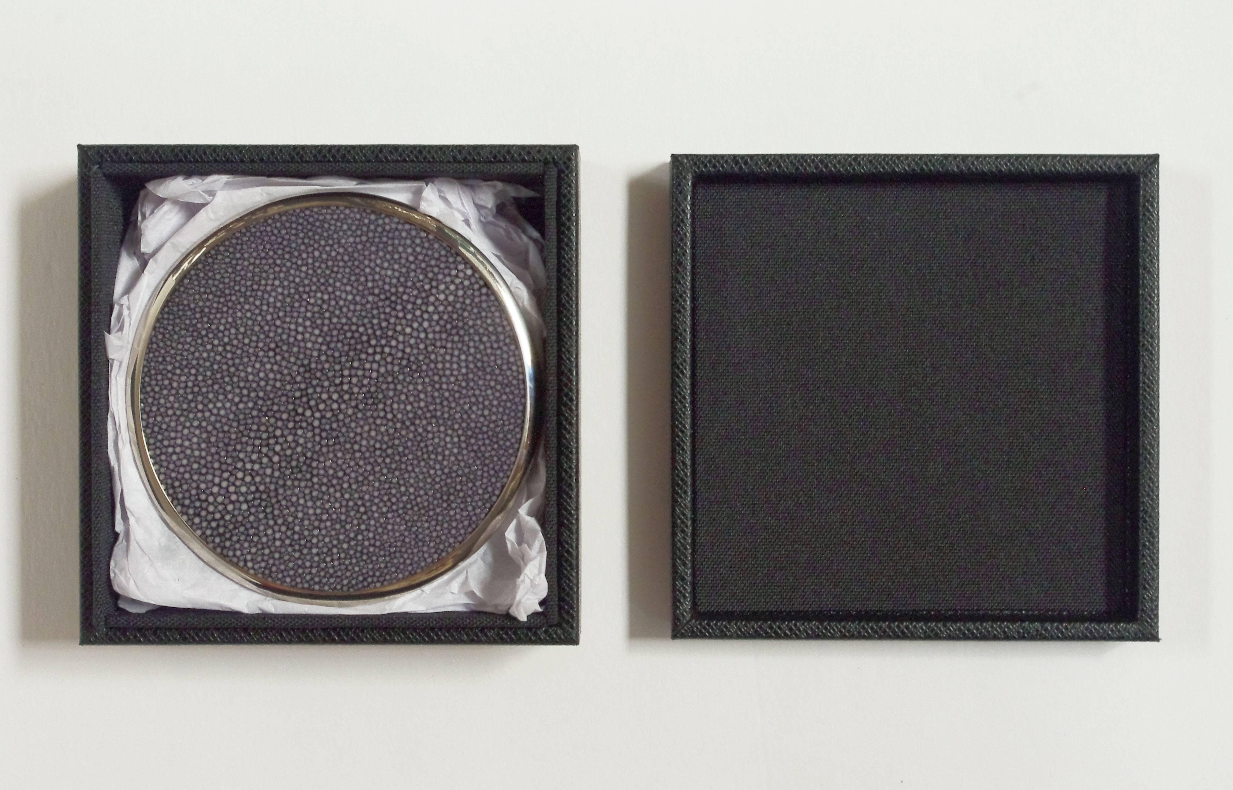 Italian black shagreen and nickel-plated coasters with matching black leather box designed by Fabio Bergomi for Fabio Ltd / Made in Italy
Coaster diameter: 4.5 inches, box depth: 5.5 inches, box width: 5.5 inches, box height: 2.5 inches
1 set in
