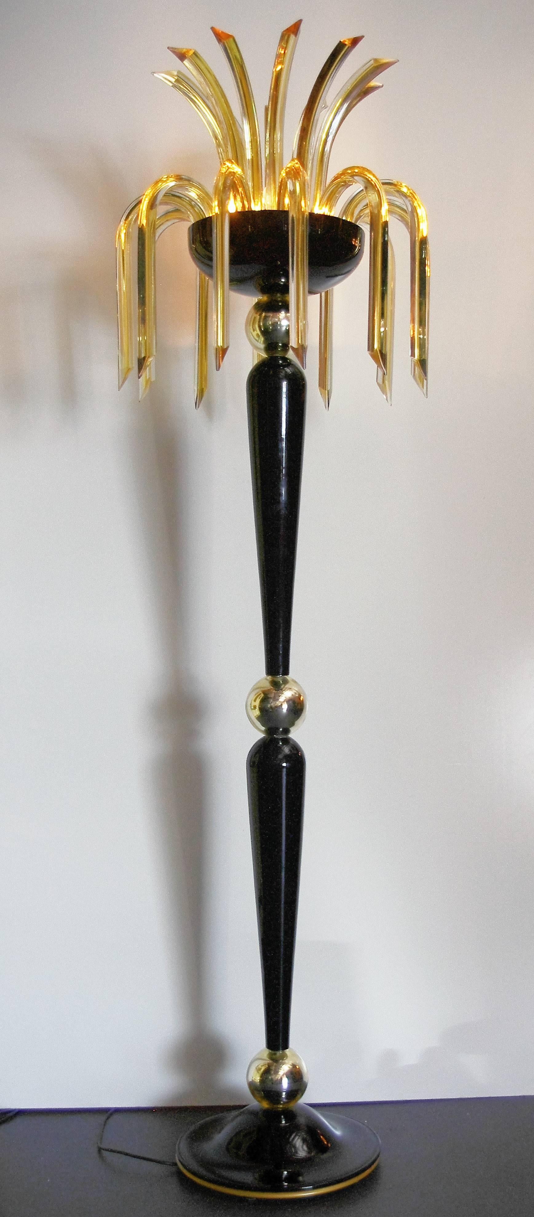 One of a kind pair of Italian modern floor lamps with blown black Murano glass stems and blown mercury glass globes with scrolling gold infused Murano Triedri glasses, designed by Fabio Bergomi for Fabio Ltd / Made in Italy
1 light E26 or E27 type
