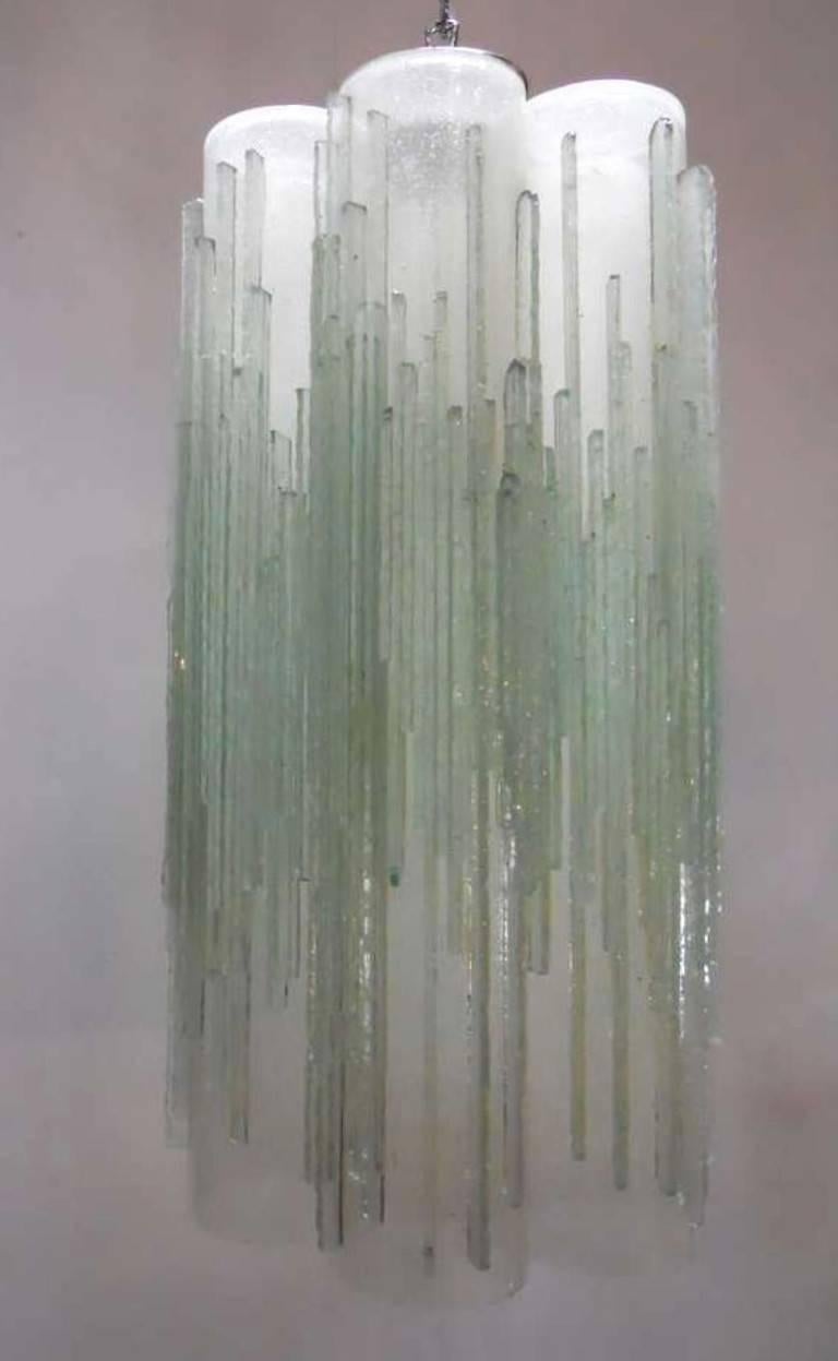 Vintage Italian pendant with clear frosted Murano glasses hand blown into tubes with distinct textured icicle structures, mounted on chrome hardware / Designed by Poliarte circa 1970’s / Made in Italy 
1 light / E26 or E27 type / max 60W
Height: 26