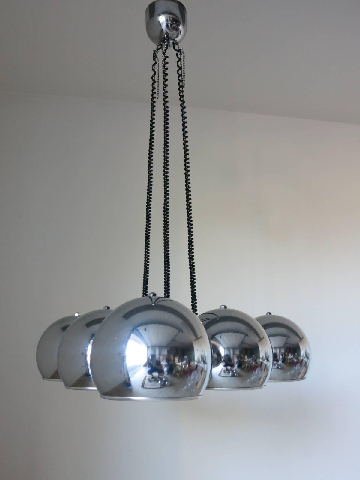 Vintage Italian pendant with six chrome globes mounted in a triangular shape / Designed by Gino Sarfatti circa 1970’s / Made in Italy
6 lights / E26 or E27 type / max 60W each
Diameter: 28 inches / Maximum Height: 41 inches (Height is adjustable)
1