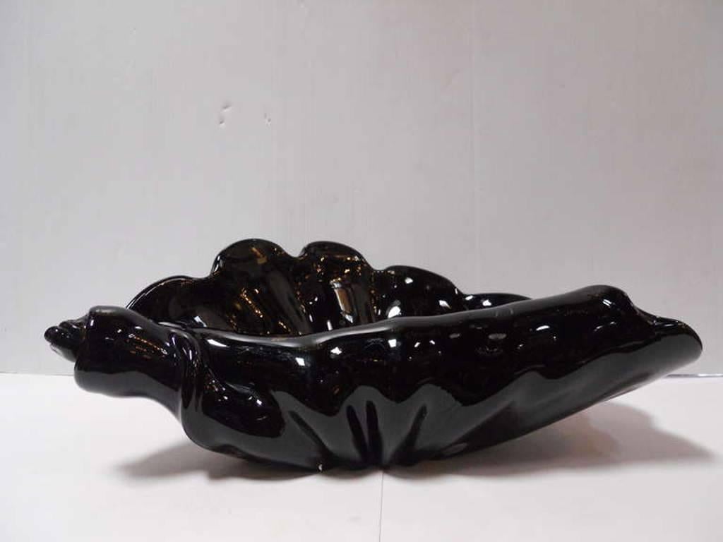 Italian vintage sea shell sculpture hand blown and crafted with dark amethyst Murano glass, signed on the base 
Made in Italy in the 1960’s
Depth: 11 inches / Width: 19 inches / Height: 6 inches
2 in stock in Palm Springs currently ON 40% OFF SALE