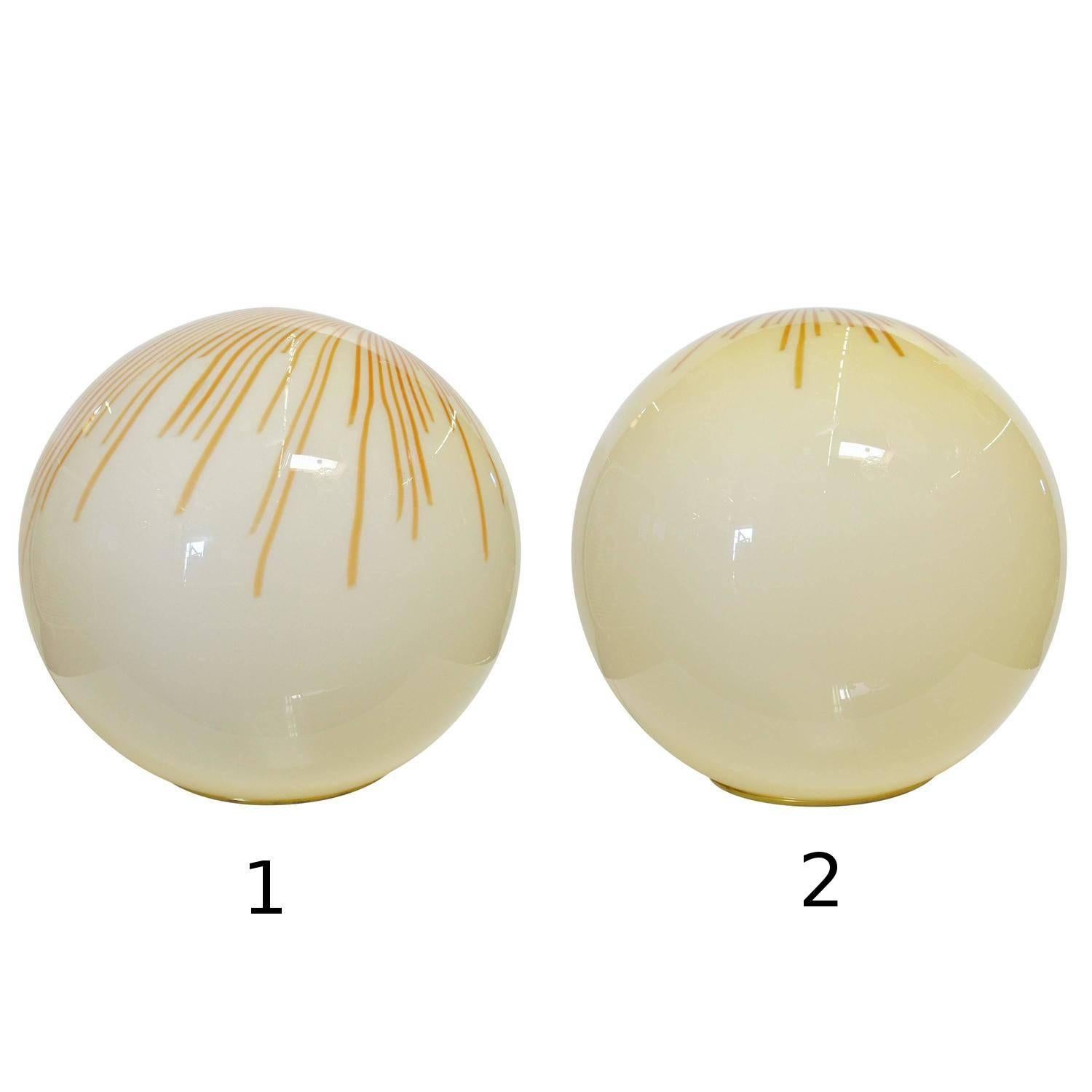 Pair of "Anemone" Italian Murano glass globe table lamps or floor lamps, by Ludovico Diaz de Santillana for Venini.
Can be sold individually ; price listed is for one lamp.
Single light socket each lamp/wired for U.S.