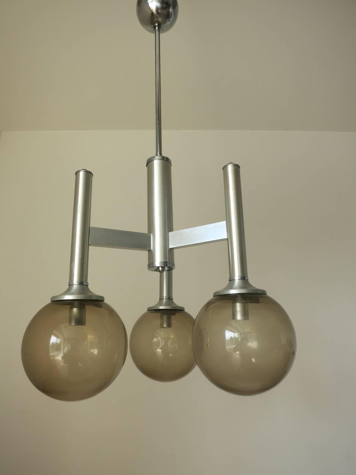 Vintage Italian pendant with three smoky Murano glass globes, mounted on brushed nickel frame / Designed by Sciolari circa 1960’s / Made in Italy
3 lights / E12 or E14 type / max 40W 
Diameter: 14 inches / Height: 34 inches including rod and