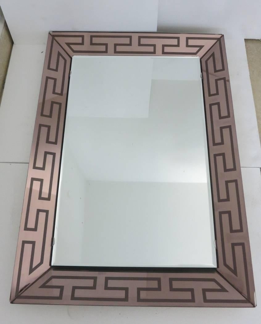 Italian galvorate mirror by Metalvetro with Greek pattern.
Original sticker on the back.