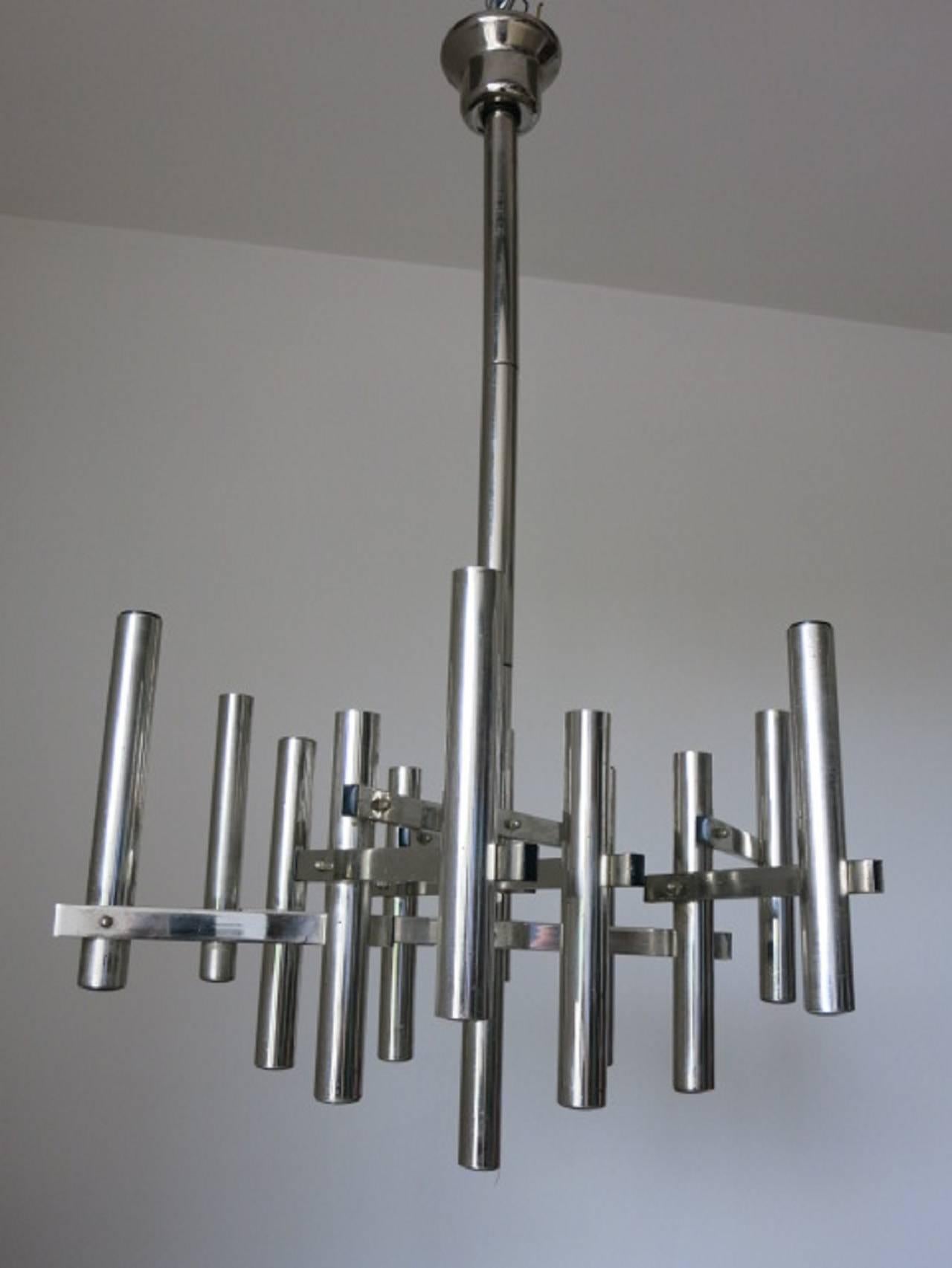 Original vintage tubular chrome pendant / Designed by Sciolari circa 1960’s / Made in Italy 
12 lights / E14 type / max 40W each
Diameter: 24 inches / Height: 37 inches including rod and canopy
1 in stock in Palm Springs currently ON 50% OFF SALE