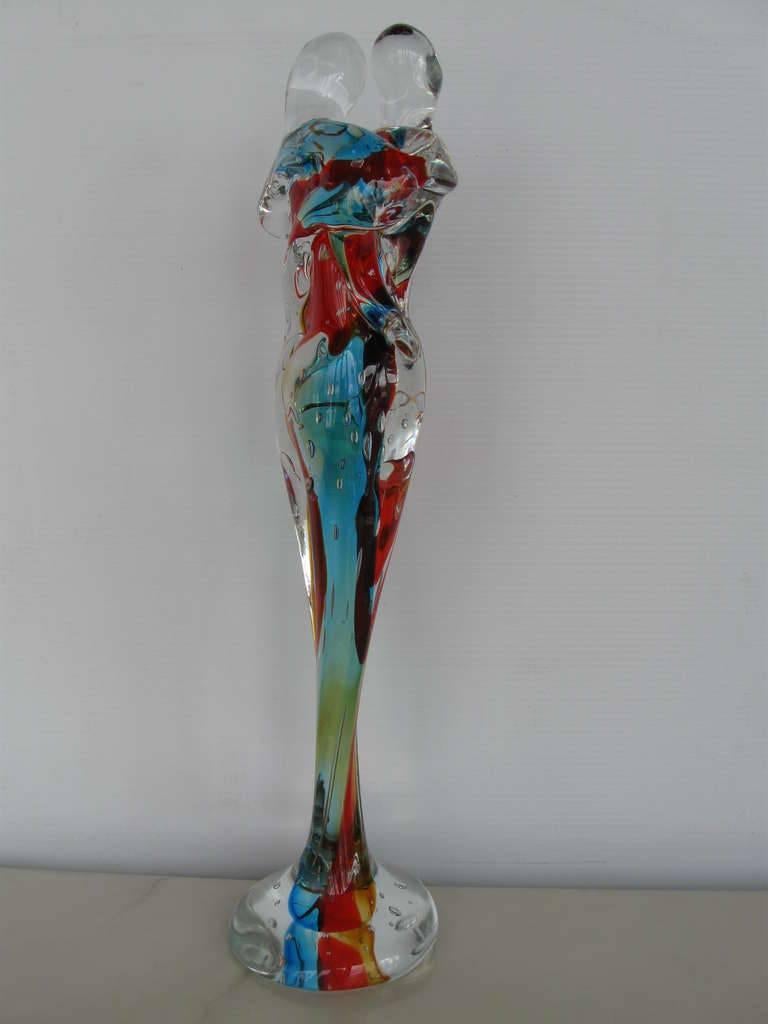 Abstract clear, red and blue Murano sculpture of two lovers by Camozzo, signed on the base
Made in Italy in the 1970’s
Height: 23 inches / Diameter: 6 inches
1 in stock in Palm Springs currently ON 40% OFF SALE for $1,079!!!
Order Reference #: