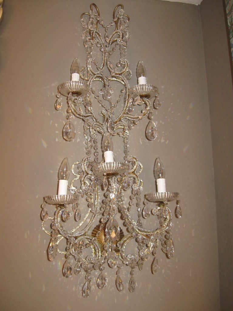 Original vintage Florentine gilded sconce with Swarovski crystals
Made in Italy in the 1960s
Five lights / max 40W each
Two in stock in Palm Springs.
     