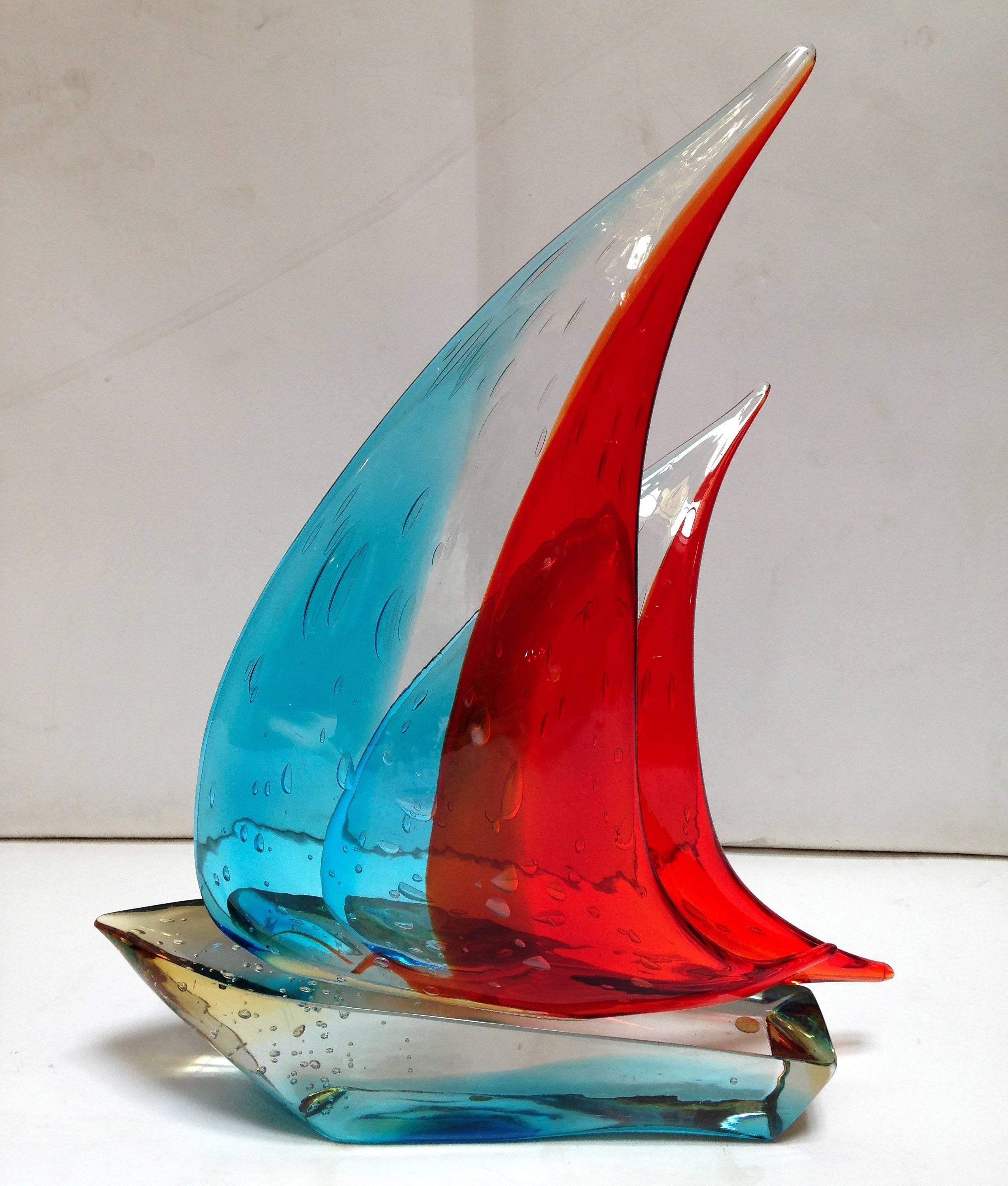 Vintage Italian double sail boat hand blown and crafted in blue and red Murano glass by Sergio Constantini 
Signed on the base / Made in Italy in the 1960’s 
Height: 20 inches / Width: 15 inches / Depth: 4 inches 
1 in stock in Palm Springs