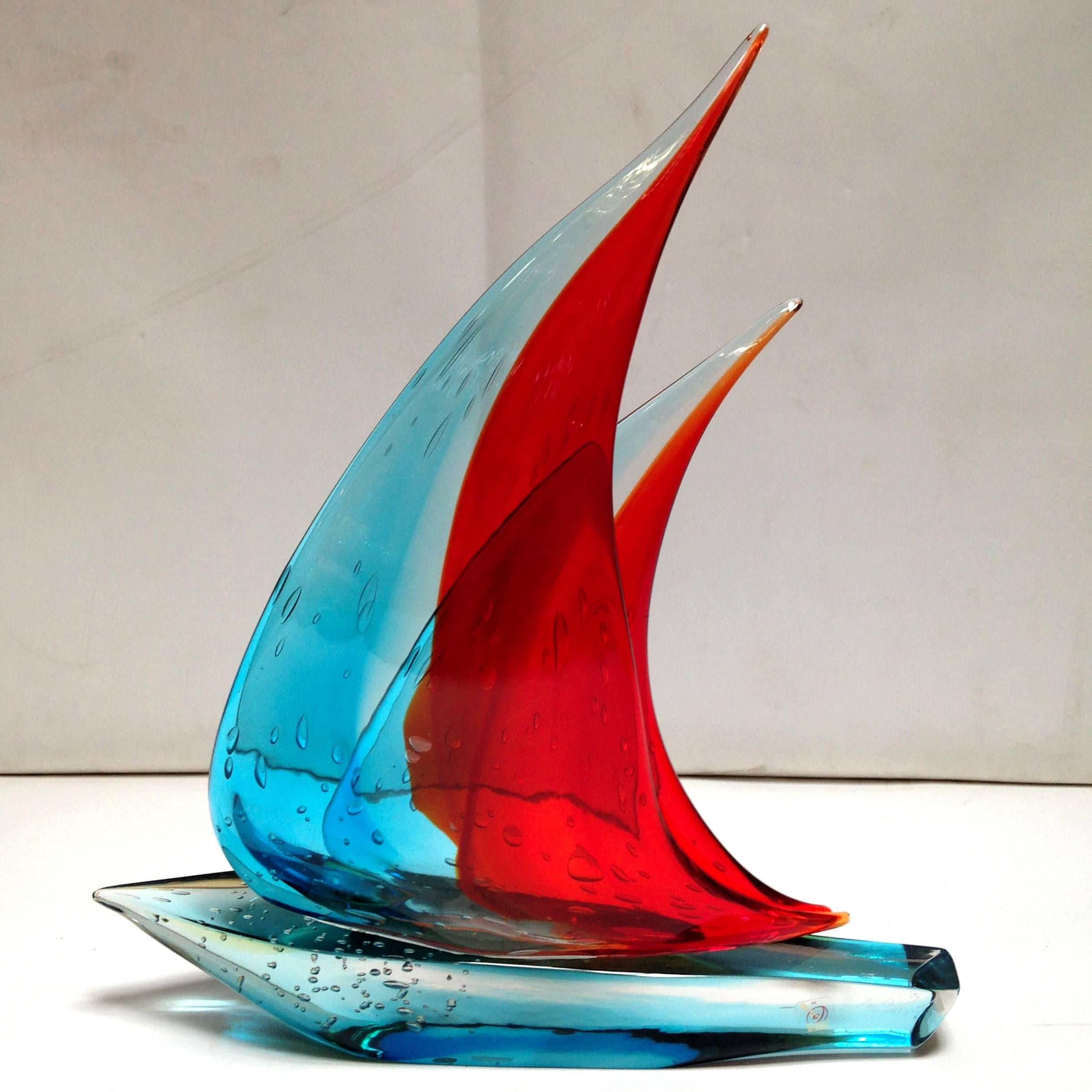 Vintage Italian double sail boat hand blown and crafted in blue and red Murano glass by Sergio Constantini 
Signed on the base / Made in Italy in the 1960’s 
Height: 20 inches / Width: 17.5 inches / Depth: 3.5 inches 
1 in stock in Palm Springs