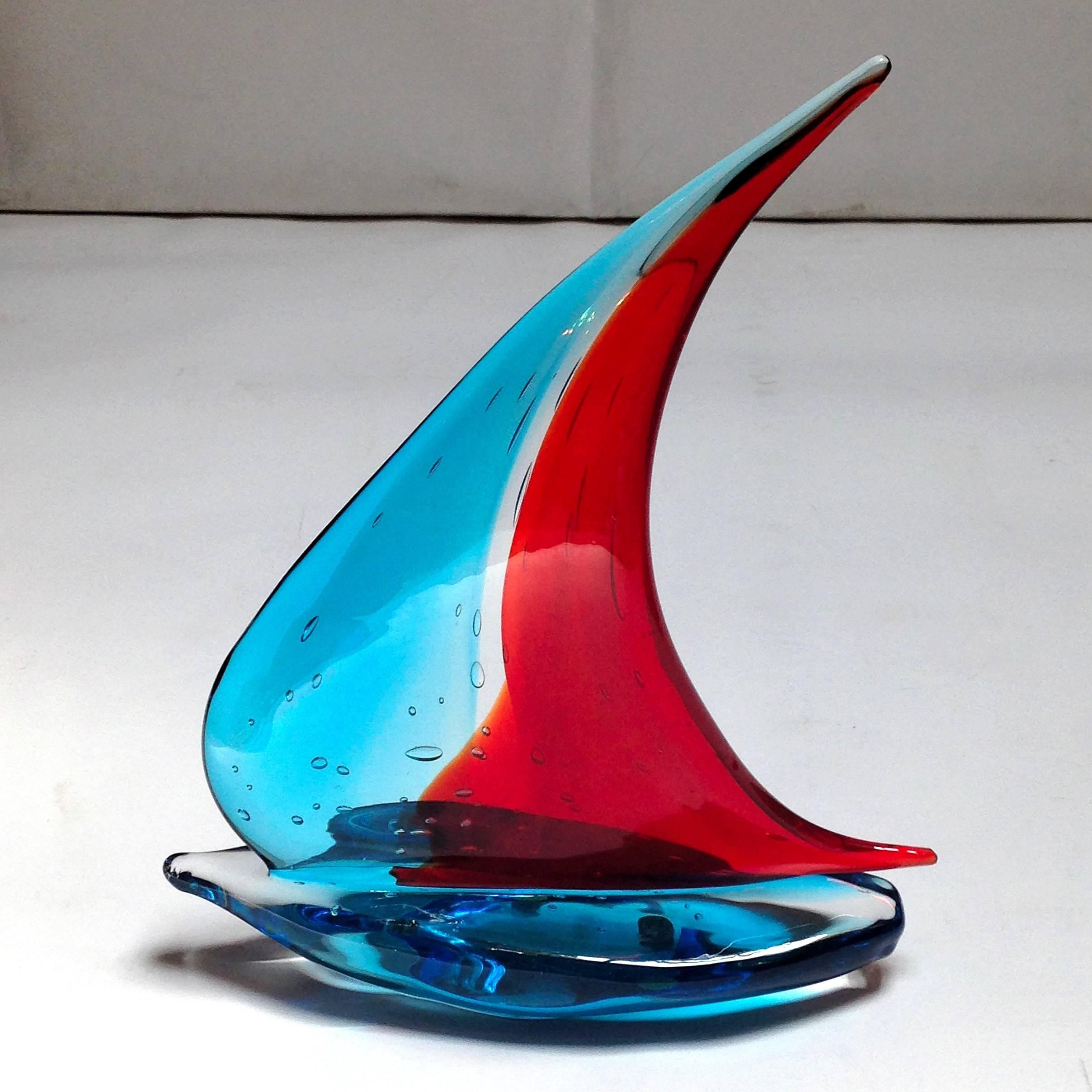 Vintage Italian single sailboat hand blown and crafted in blue and red Murano glass by Sergio Constantini
Signed on the base / Made in Italy in the 1960’s
Height: 13 inches / Width: 10 inches / Depth: 3 inches
1 in stock in Palm Springs currently ON