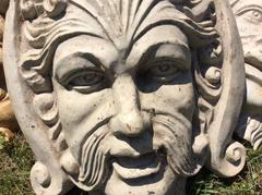Set of Four Large Neoclassical Style Iron Masks
