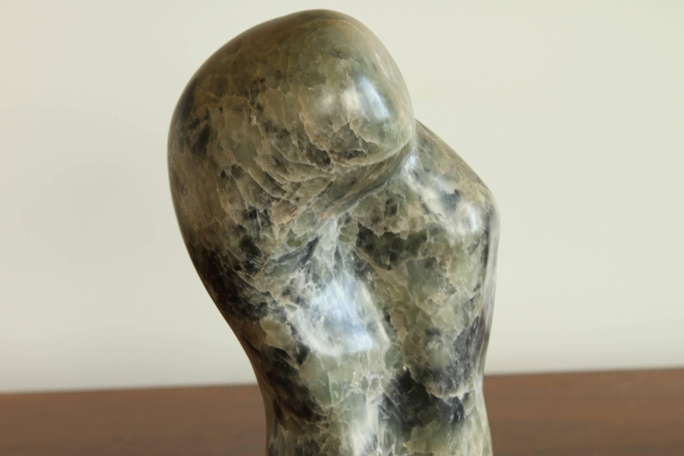 Well carved and polished group of midcentury mounted sculptures with excellent color and form. The sculptor clearly influenced by some of the top sculptors of the time including Barbara Hepworth, Henry Moore and Jean Hans Arp.