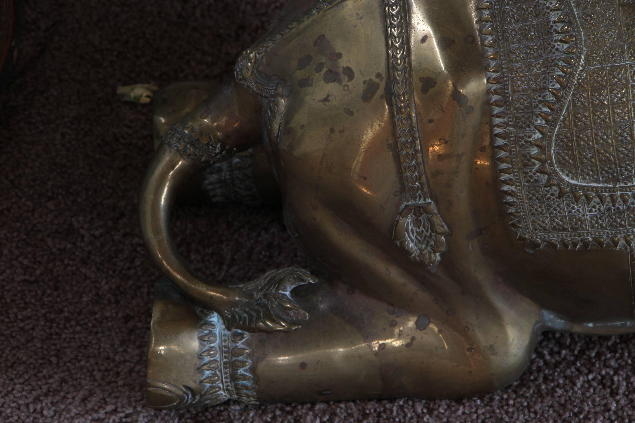 Cast brass elephant sculpture. Very decorative with great form and very good details.