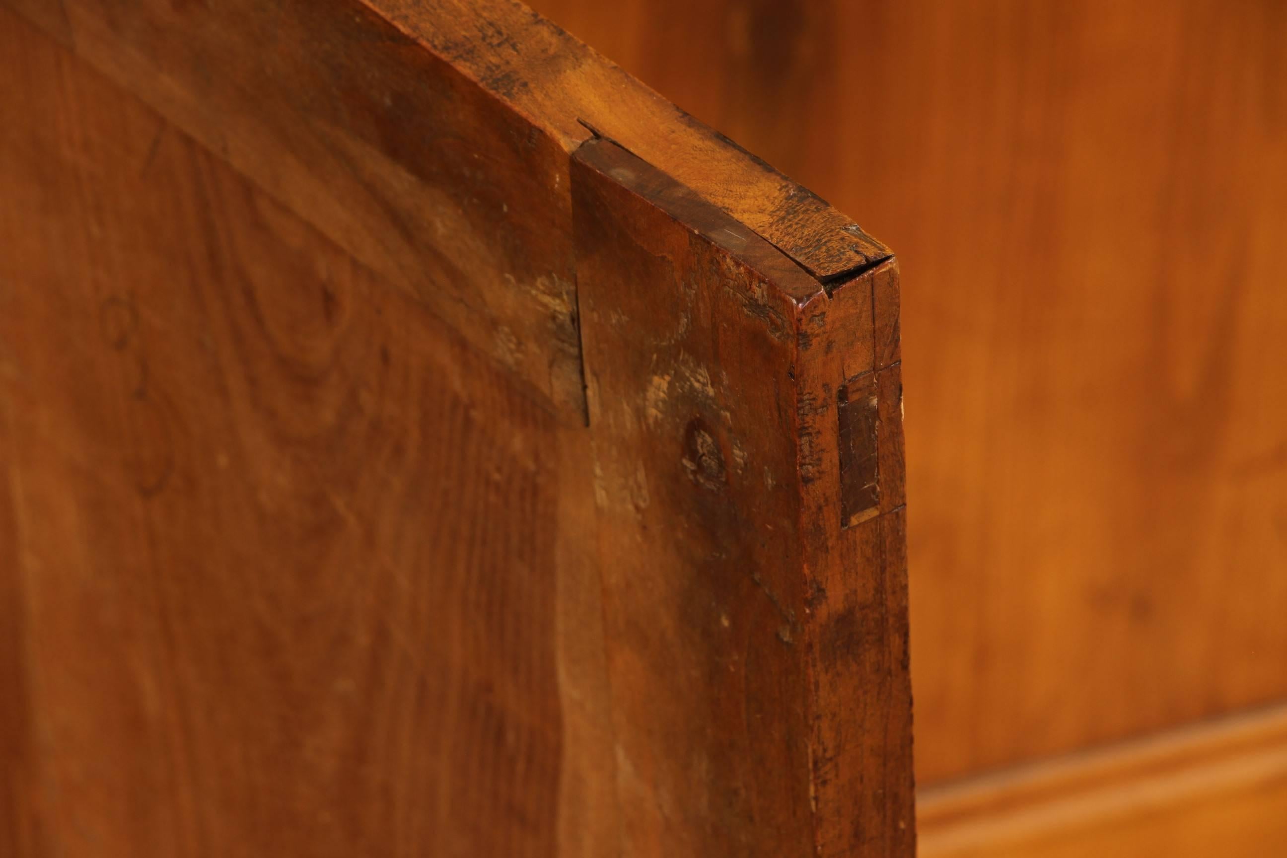 Well constructed mid-19th century French server with five drawers over five paneled doors, all in warm cherry. An imposingly length is kept in check by a very agreeable 20 inch depth. Fine large brass flat button pulls. While there are locks, there