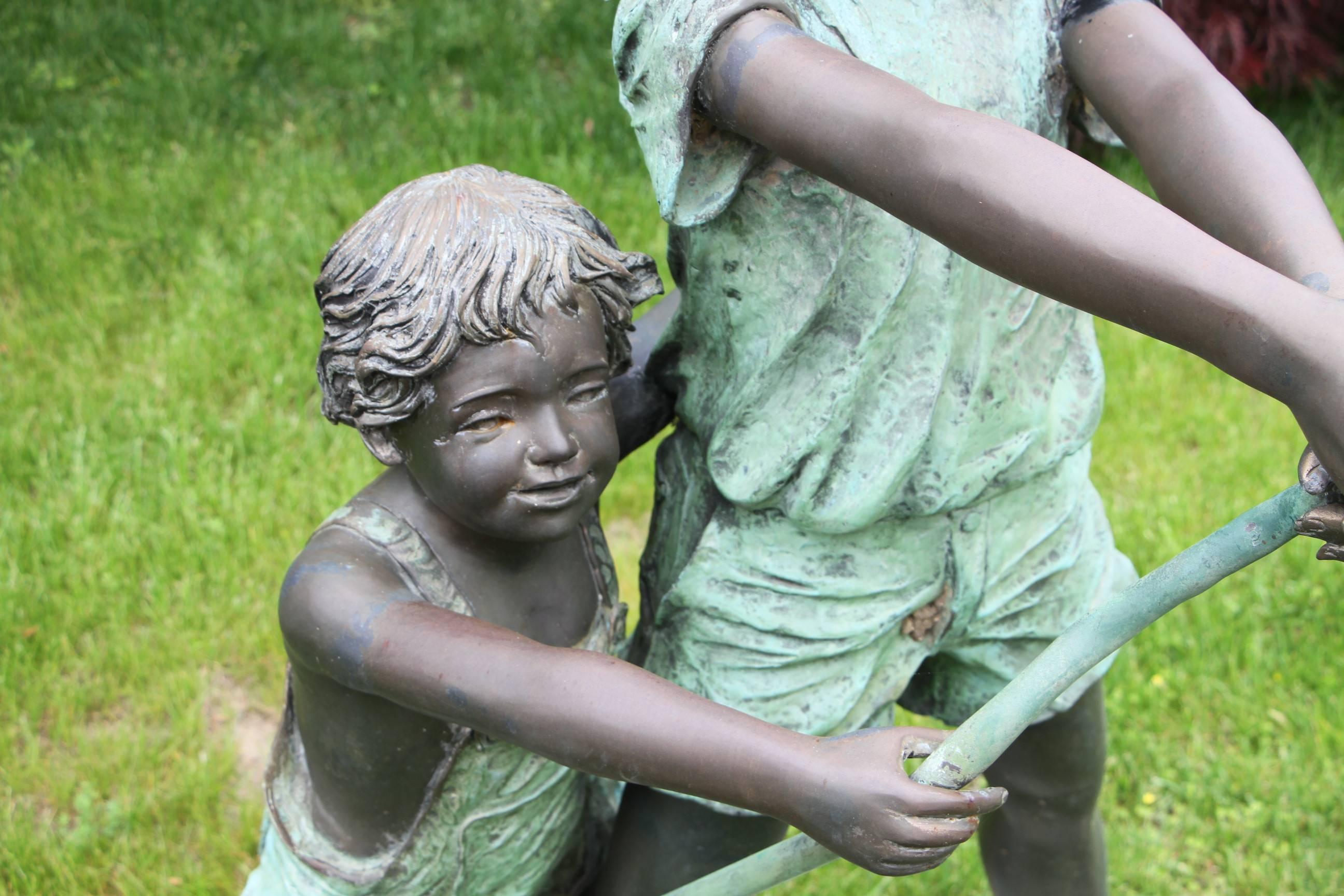 Cast Bronze Boy and Girl with Hose Sculpture