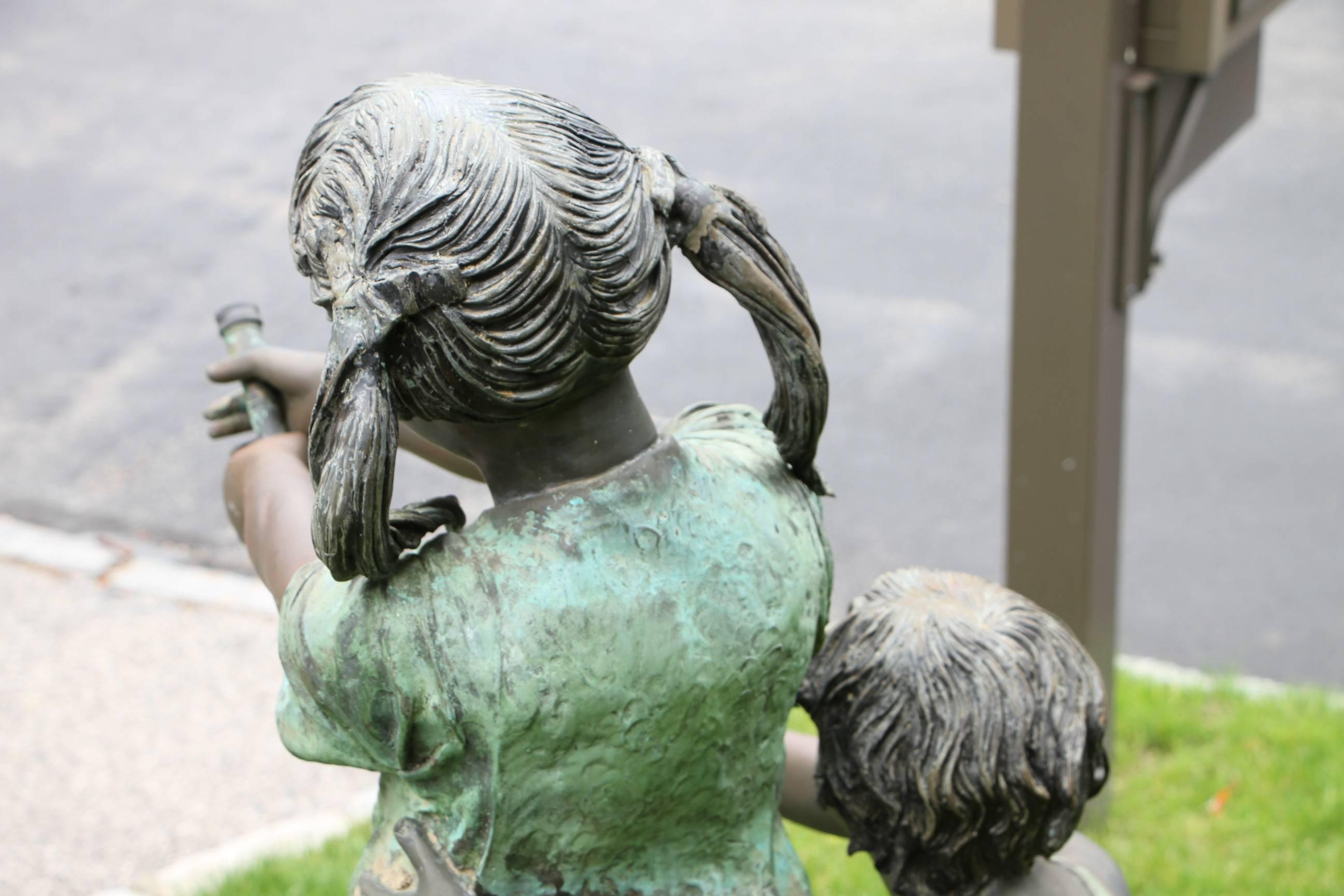 American Craftsman Bronze Boy and Girl with Hose Sculpture