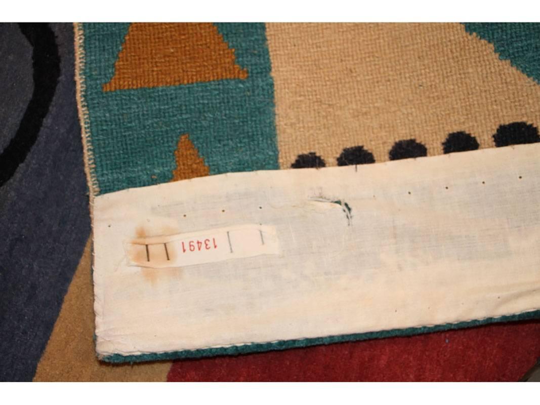 Colorful abstract geometric area carpet, 100% wool, Knecht Ag, Made in Switzerland, measuring 73" x 46".
Good condition.