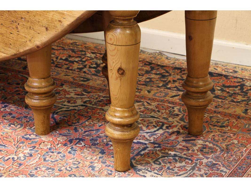20th Century Massive Reclaimed Wood Oval Drop-Leaf Farm Table