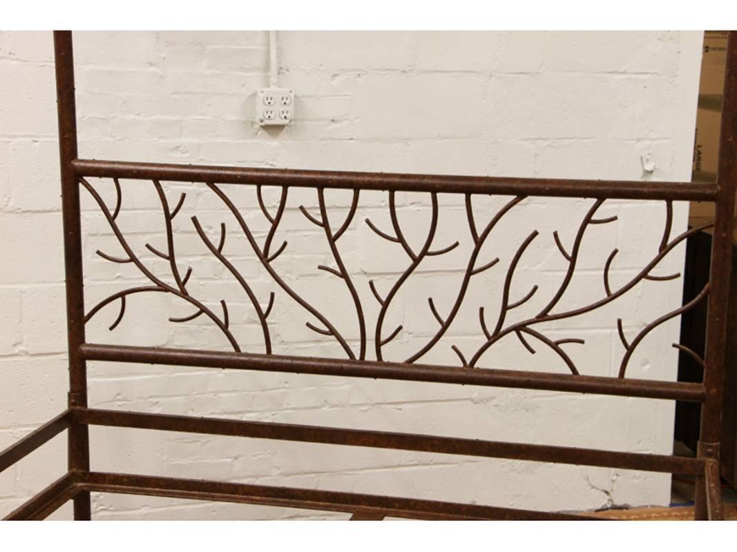 Very well made faux finished iron bed with tree branch posters. Intricate twining branch headboard.
