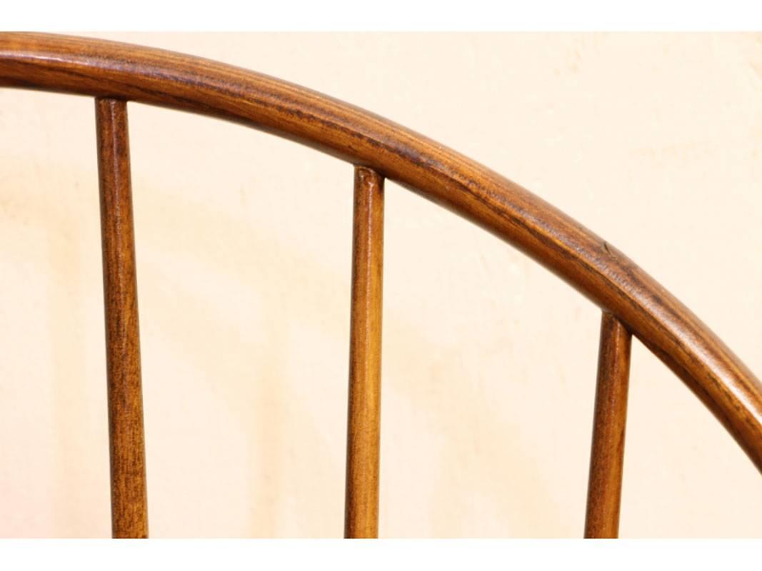 Six fine Windsor style chairs with excellent traditional form. Carved saddle style seats with turned legs and stretchers. Scalloped arms with sack back Windsor backs. From the bucks county collection by Stephen Von Hohen, designer and maker of
