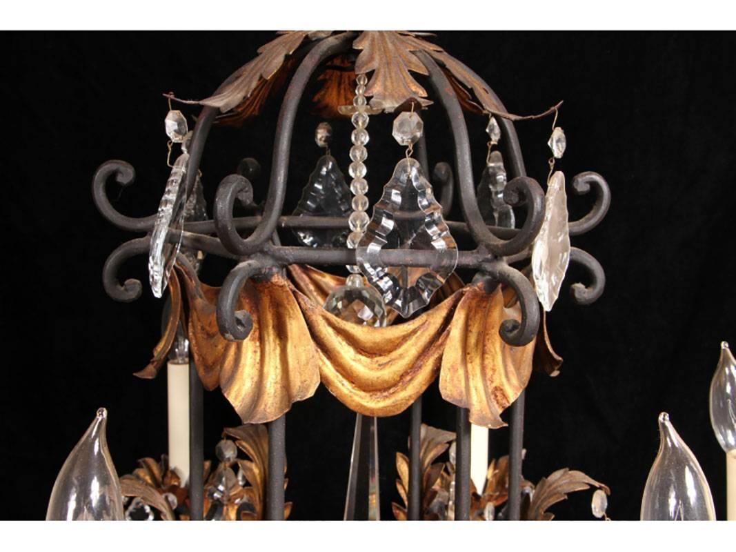 With stylish form and a good medium size. Wrought iron with gold leaf accents.