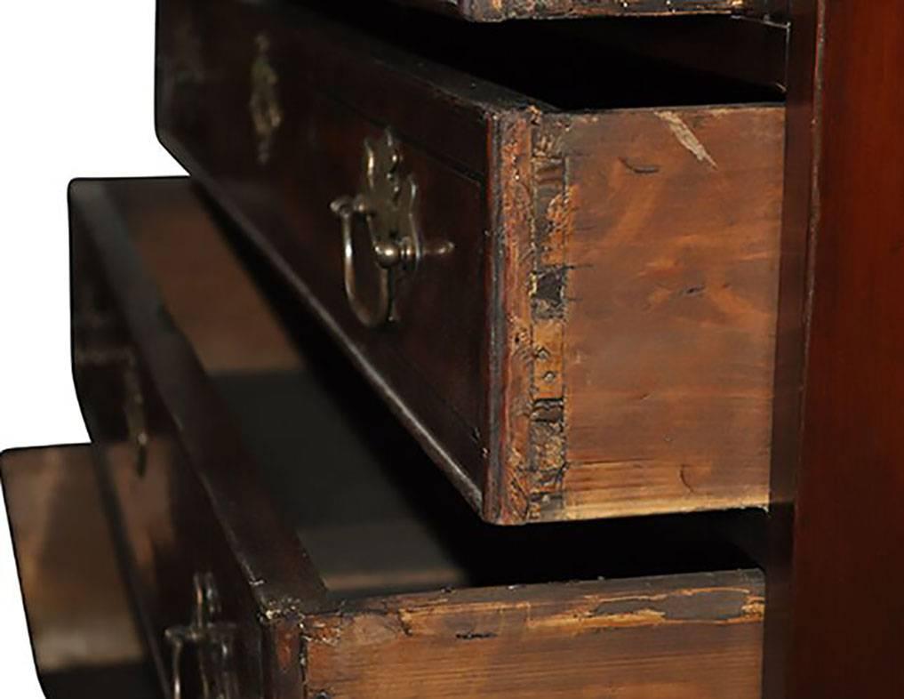 From its ebonized-lined inlay and dovetail drawers to its rich burl panels and original brass hardware, this is fit to be the trophy piece for your library or den. Original cast brass hardware with keys, original pegs but no shelves inside hutch,