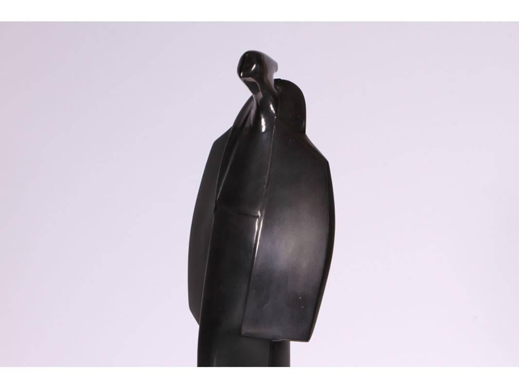 Curtis Jere figural sculpture of a cloaked figure. Signed on base and dated, 1990. Condition: wear along on the edge of the base.