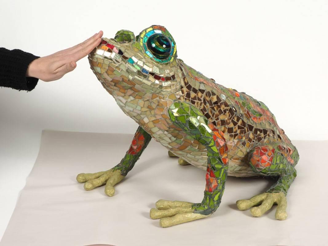A cement form frog covered with glass tile mosaics, large round iridescent glass eyes and covered toes. Reminiscent of the sculpture and artwork of Niki de Saint Phalle. Minor acceptable wear.