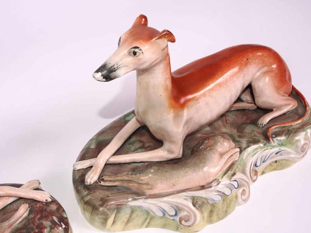 Neoclassical Pair of Antique English Staffordshire Greyhound Dogs with Game