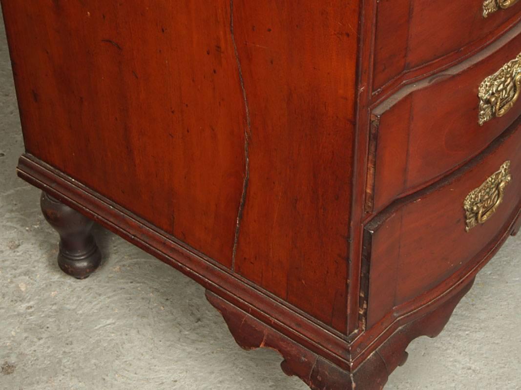 Late 18th-early 19th century mahogany drop-front writing desk with satinwood banding and marquetry fan design. Outfitted with interior drawers. Brass hardware in caduceus pattern. Scallop shell base carving and ball and claw foot. In very good