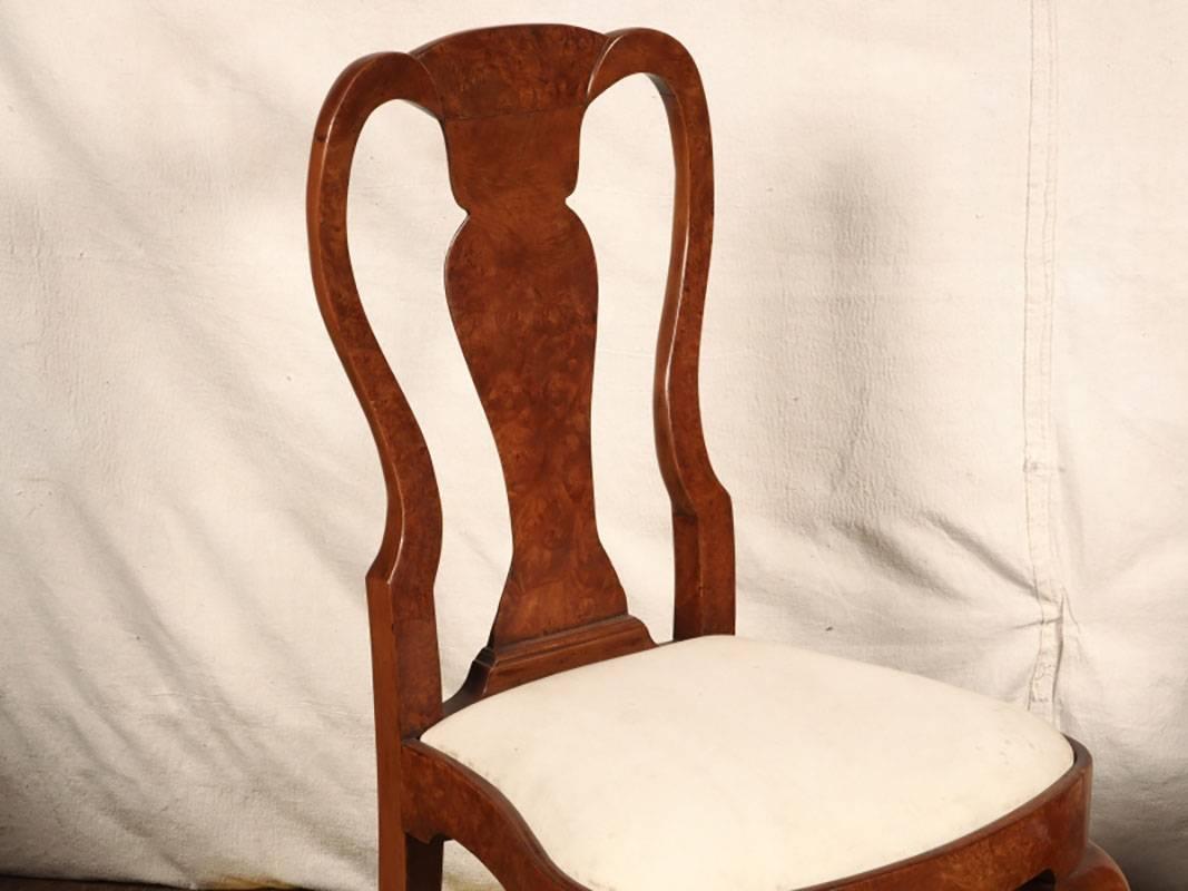 Fine set of Burl Queen Anne dining chairs in very good condition with only very minor age appropriate wear. With good weight, great form and style. Muslin cushions have age related staining and require upholstery.