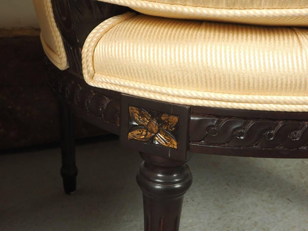Classic Mittman style with clean design. Carved ebonized wood details with gilt accent at top. Very good condition, with very slight age appropriate wear and comfortable.