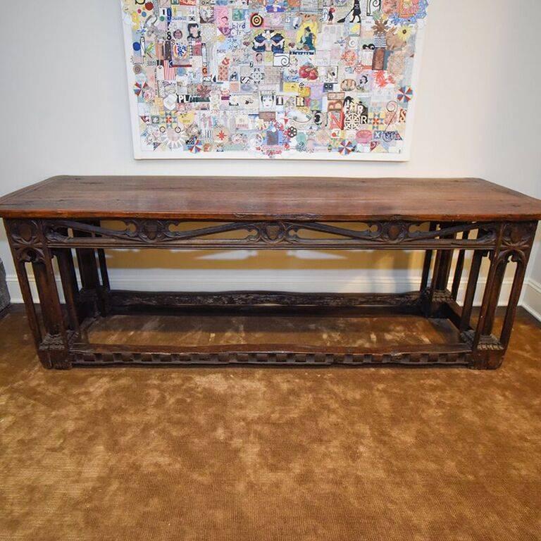 Fine quality French oak table from the 19th century with gorgeous carvings.