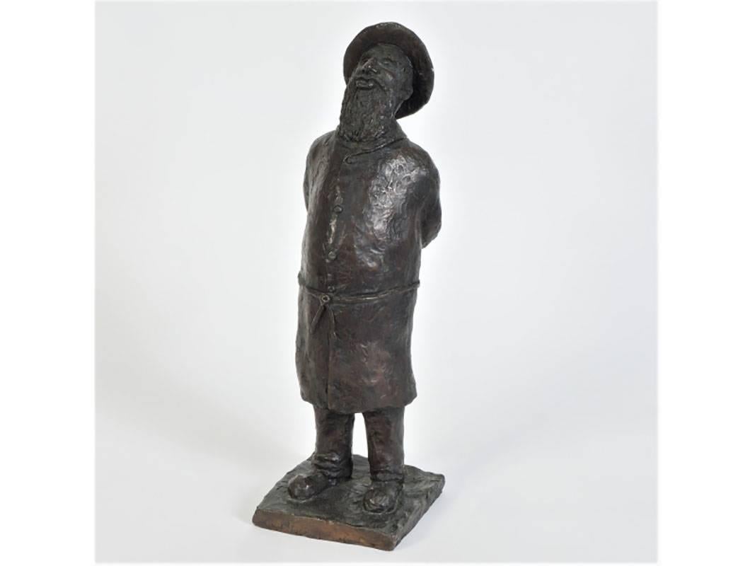 Bronze depicting a Judaic man, wearing a hat, with his arms folded back and leaning, apparently in a conversation.
Signed on base; limited edition of 3/4
Condition: good, consistent with age.