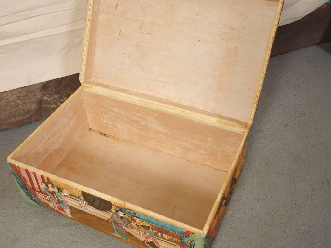 Chinese wedding trunk with all-over painted design, side handles, front brass latch, hinged lid.
Condition: Light wear, 2