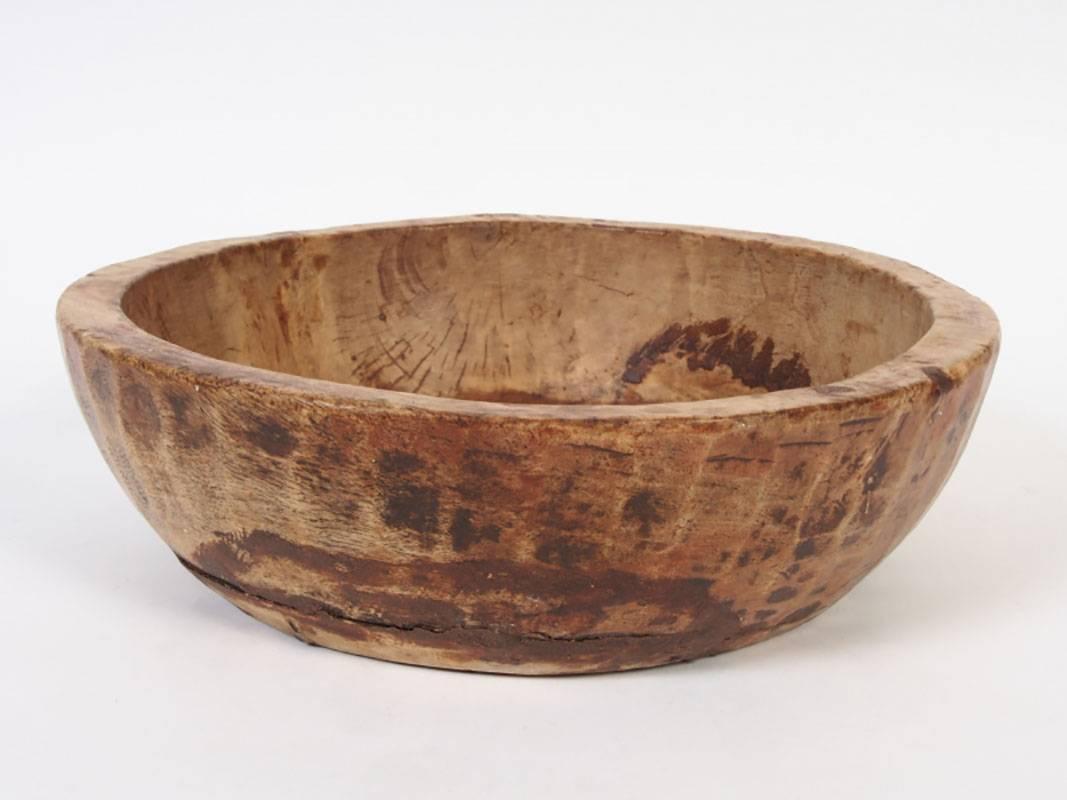 Basin shaped with fluted sides.
Condition: weathered consistent with age, long crack near the base.