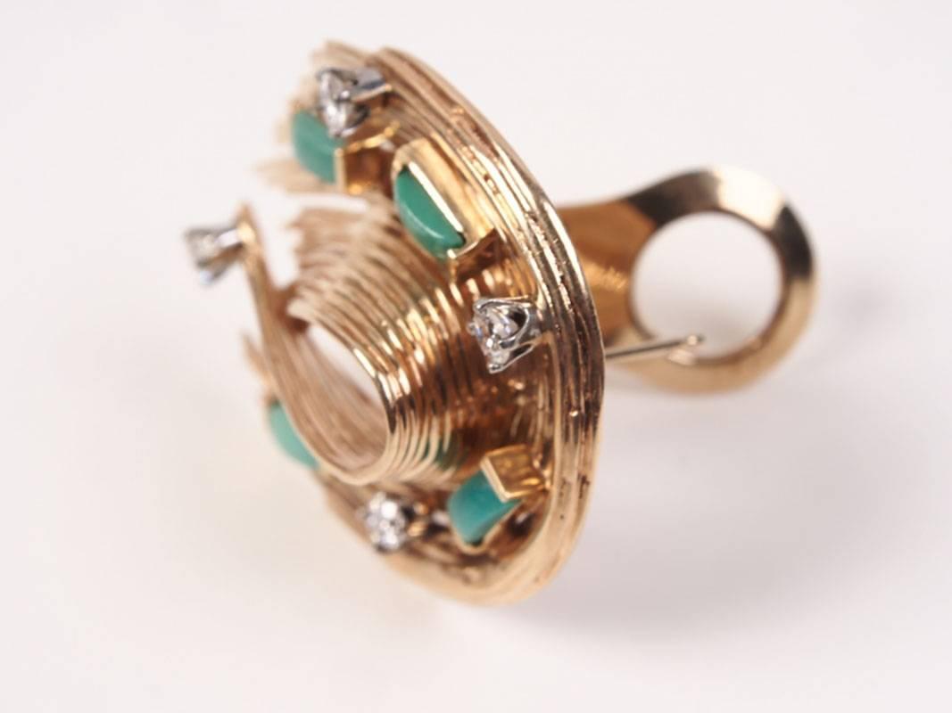 Diamond and jade accents on 14-karat yellow gold make these vintage horseshoe shaped earrings. Omega clasp backs.
11 dwt.