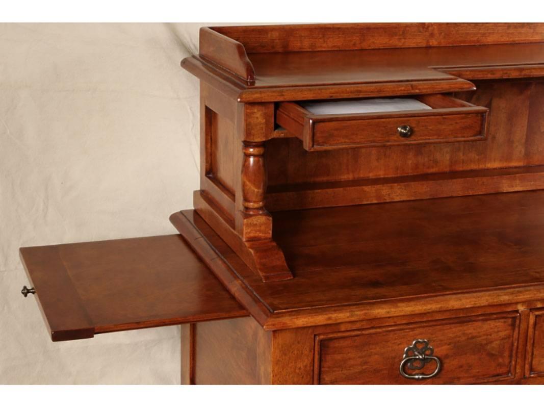 Custom bench-made cherry server with silver storage drawers and plenty of storage. Pullout shelf on each side extends your serving space. Polished steel hardware. High quality, handsome piece.
Very good condition.