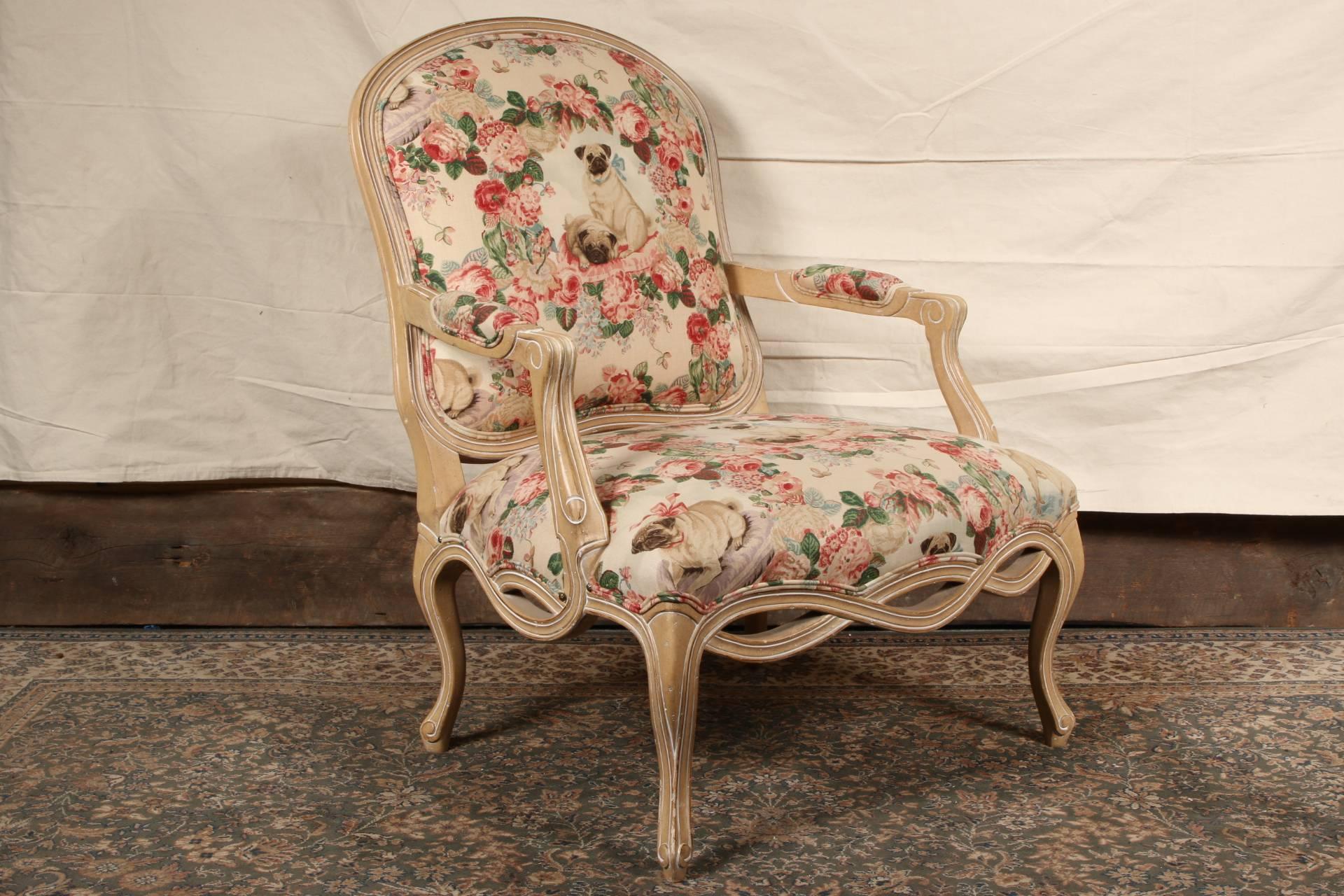 Pair of oversized Kreiss fauteuils having cream paint decorated frames in Lee Jofa pugs and petals linen blend fabric.
Condition: very good with some chips to the frames and legs.