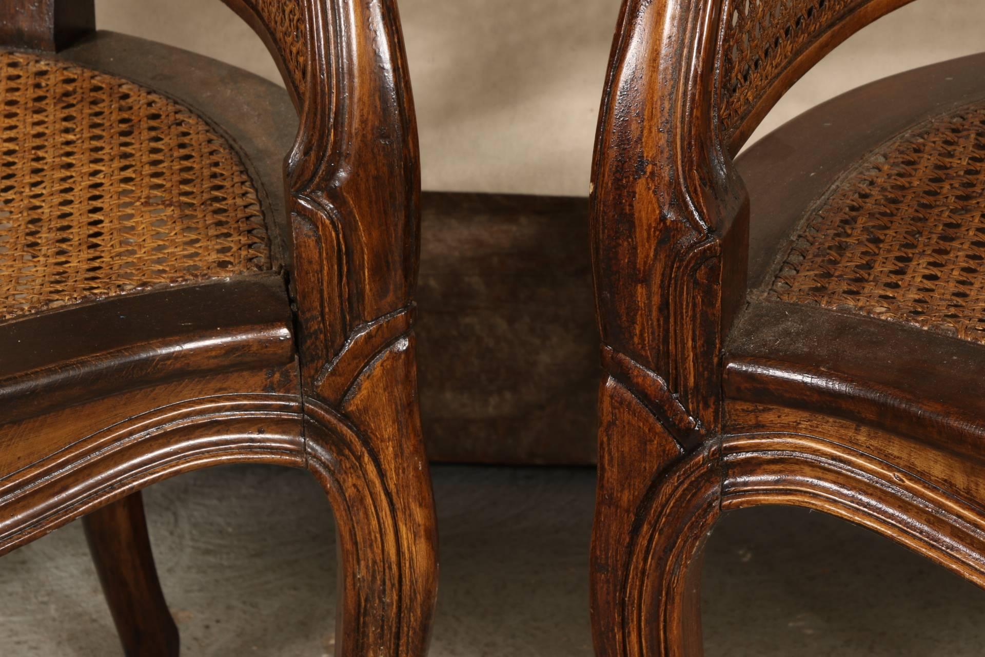 Pair of Caned Walnut Stained Bergeres 4