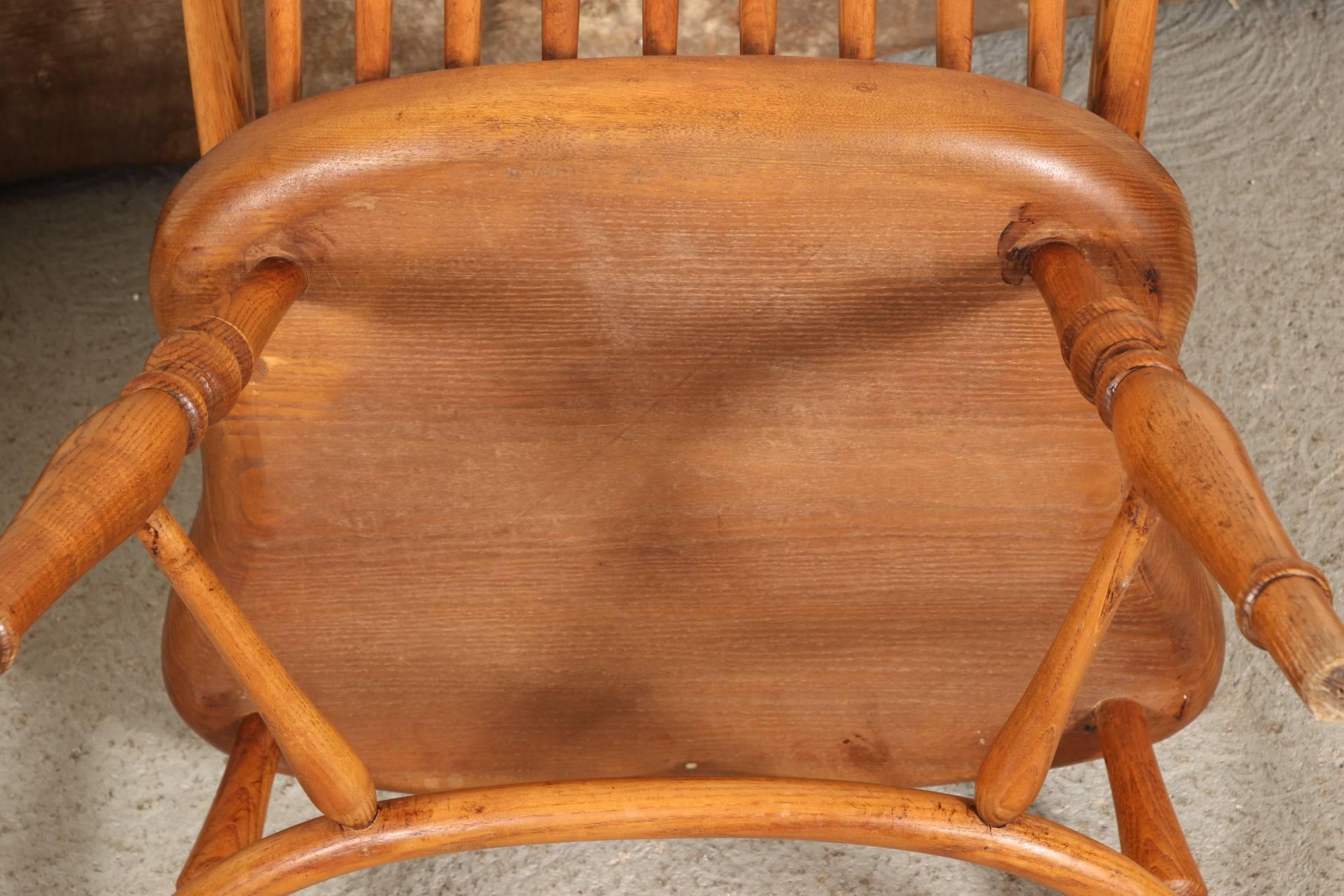 Oak with hoop shaped back frame with spindles, shaped seats, splayed and turned legs and an incurved front stretcher with two turned supports. One chair with a loose hoop attachment to the seat. Seat height is 18.5 inches.
Condition: slight wear to