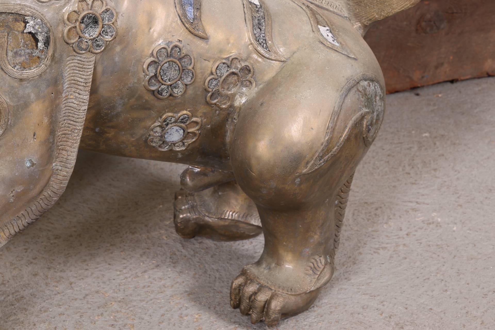 Pair of Tibetan Bronze Guardian Lion Figures In Distressed Condition For Sale In Bridgeport, CT