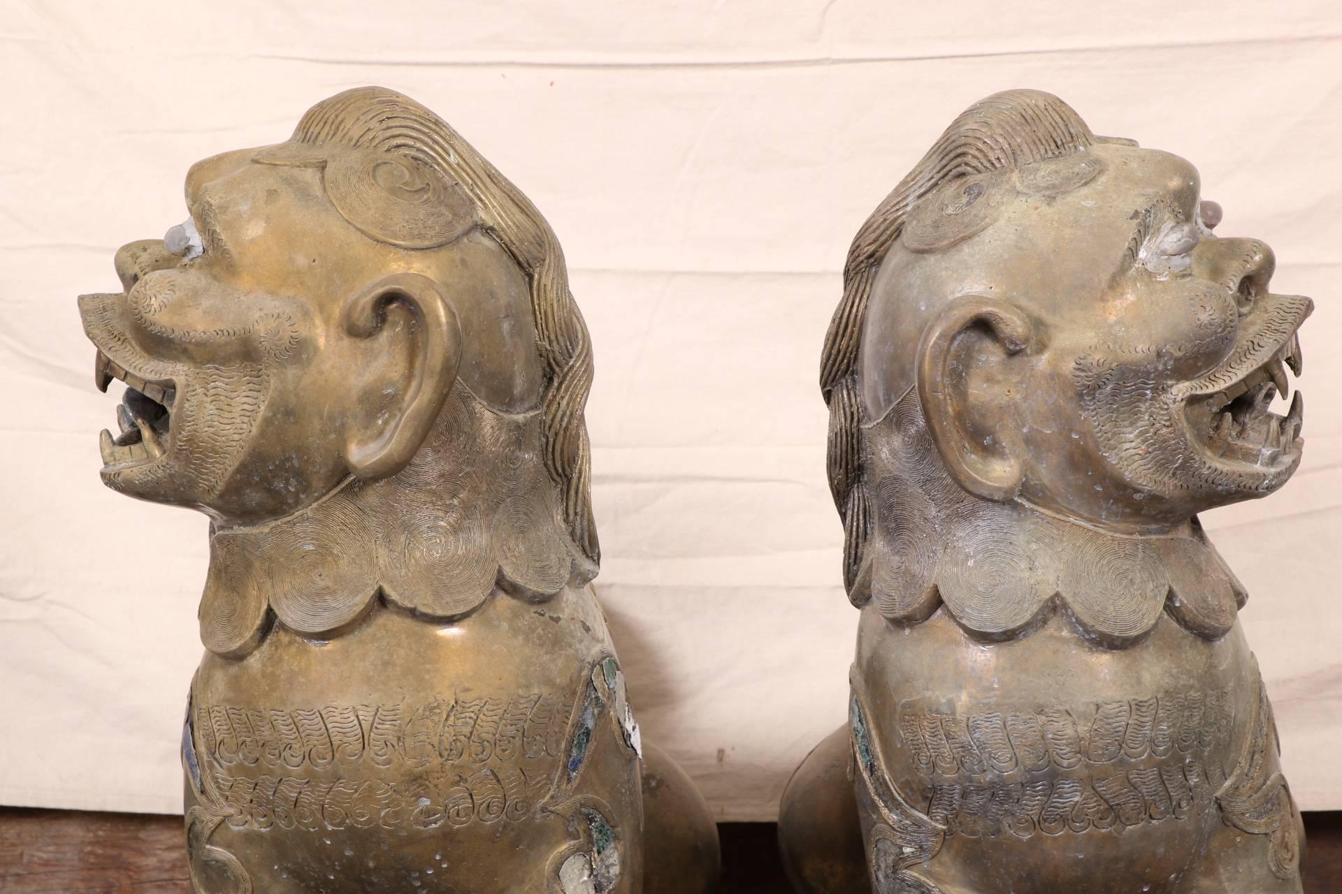 Pair of Tibetan Bronze Guardian Lion Figures For Sale 1