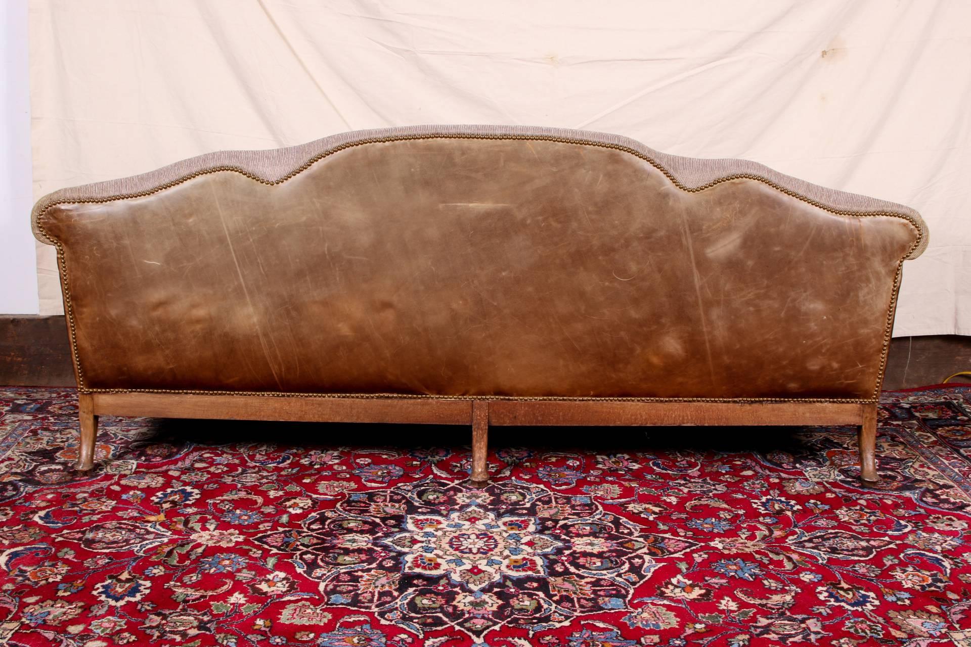 American Classical Vintage Camel Back Sofa with a Finely Carved Frame