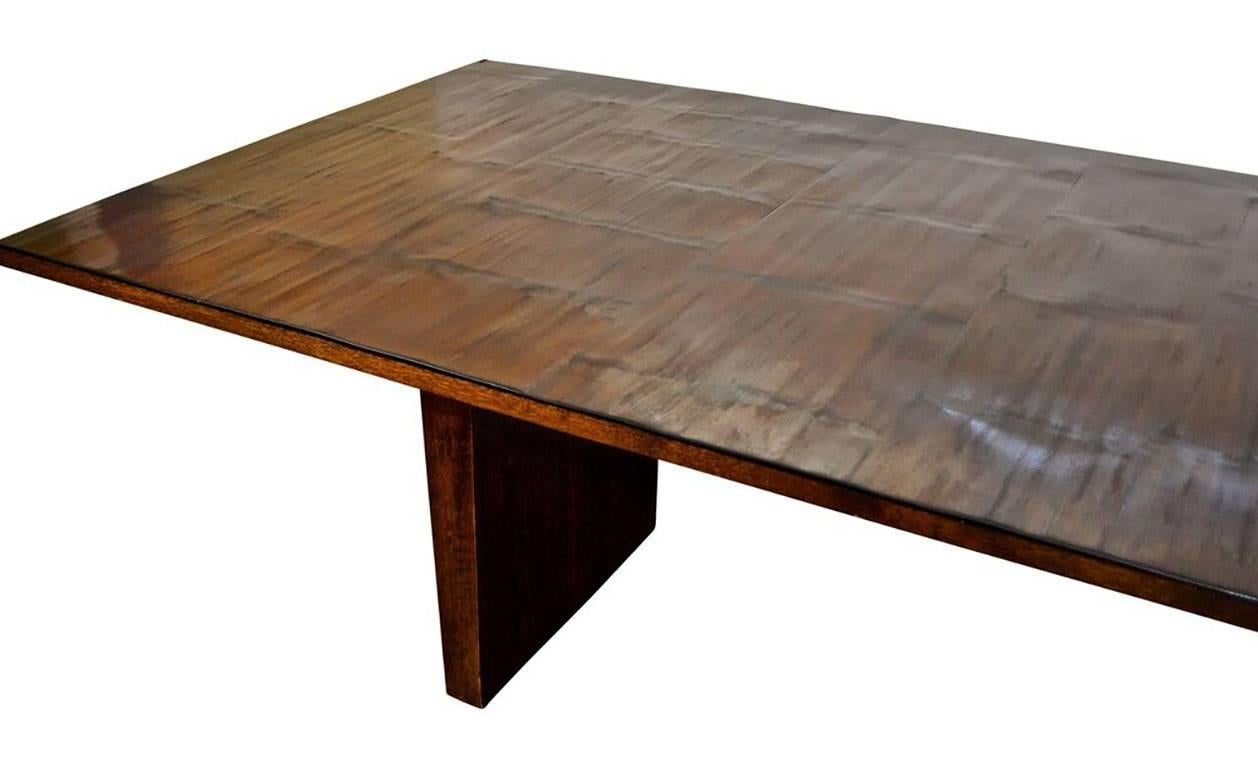 Wyeth Home Furniture is a New York furniture shop that focuses on Mid-Century Modern antiques, industrial pieces and vintage collectibles. This handmade bamboo dining table came from the showroom. The ebony split bamboo top and slab legs give the