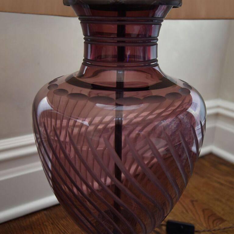 Made from spiral-cut English crystal, these gorgeous urn lamps feature a pretty amethyst hue and dove silk pleated shades.